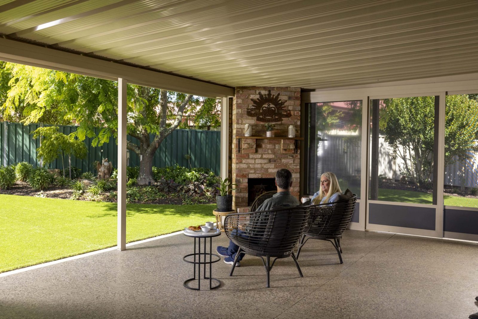 Couple on Apollo Patio with garden view