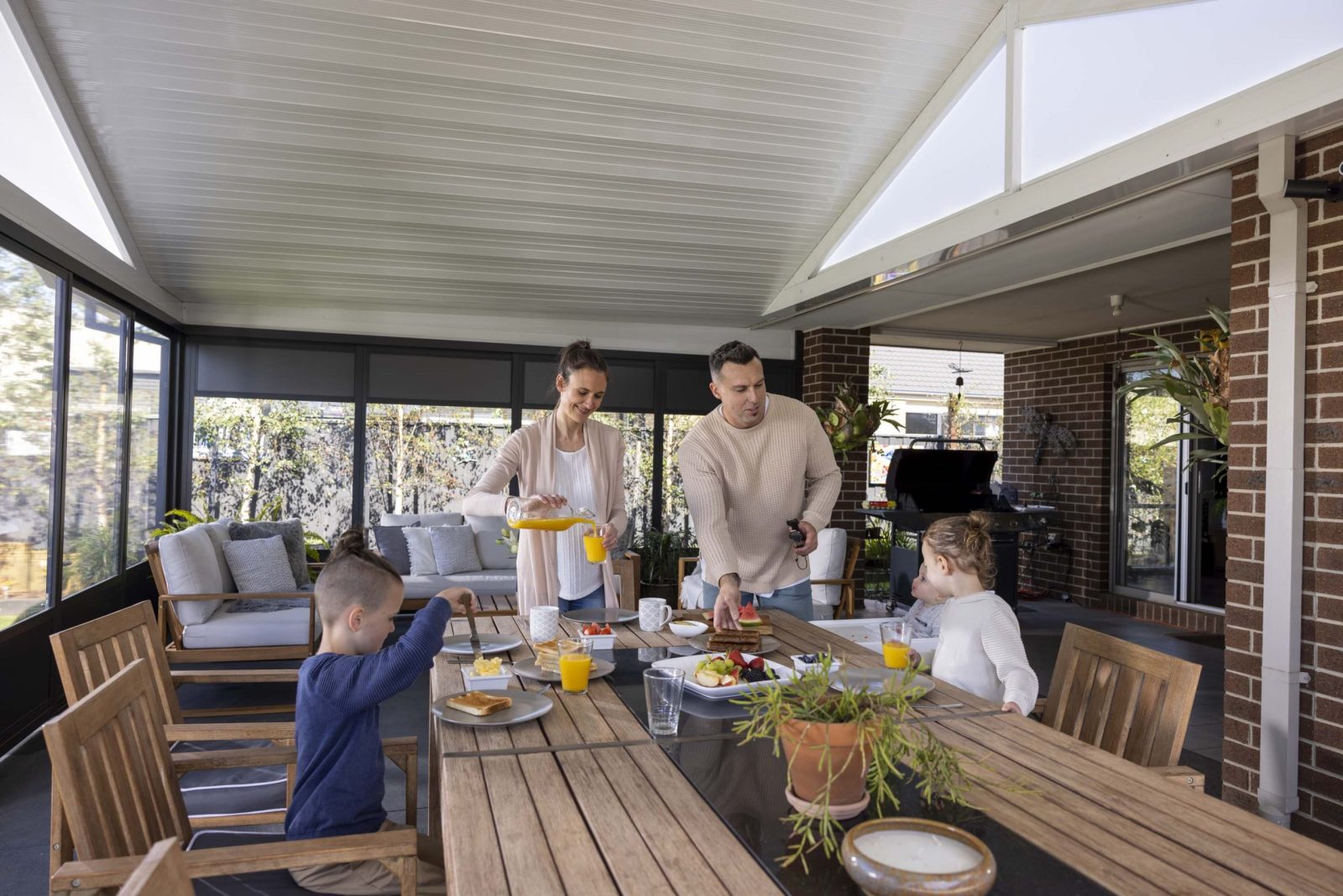 Apollo All Weather Patio Gable Roof Family enjoying breakfast